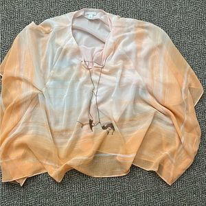 Women’s Cato flowy orange blouse with necklace. Size large